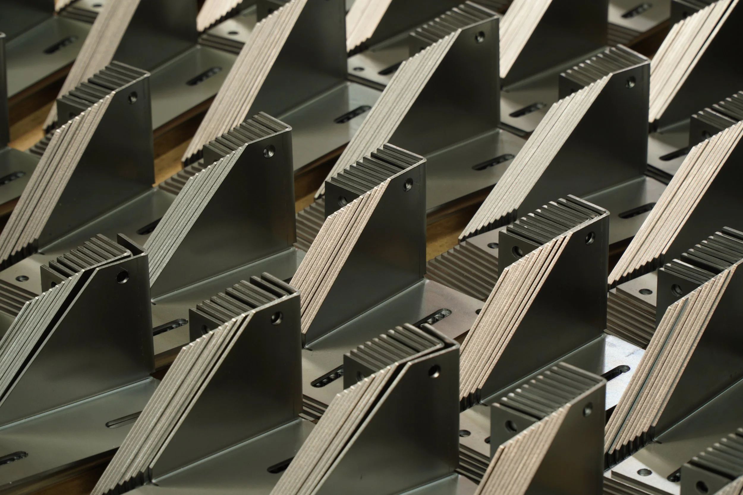 Close up of lasercut and bent brackets