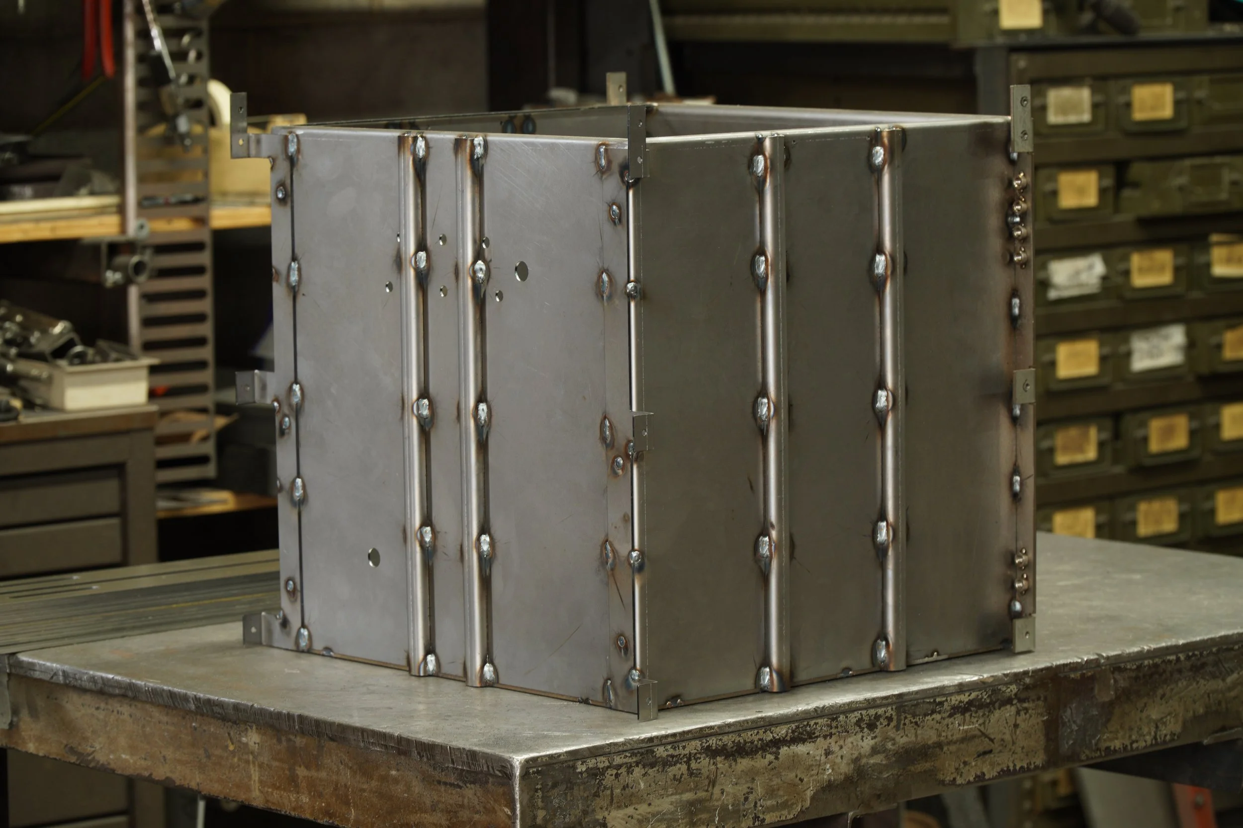 Welded sheet metal assebly with ribs